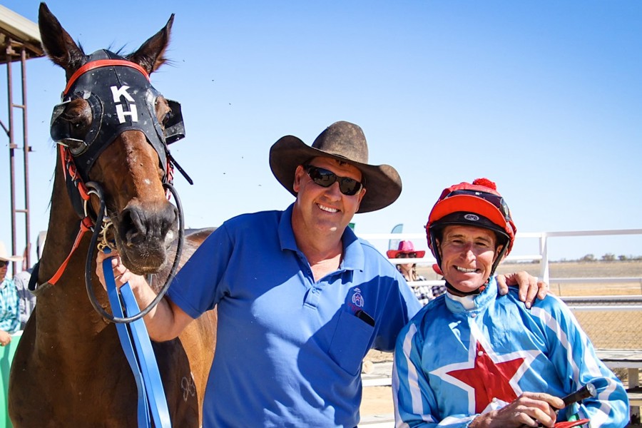Kym Healy and John Keating celebrate a Birdsville winner last year. Pictures: Roxanne Weston.