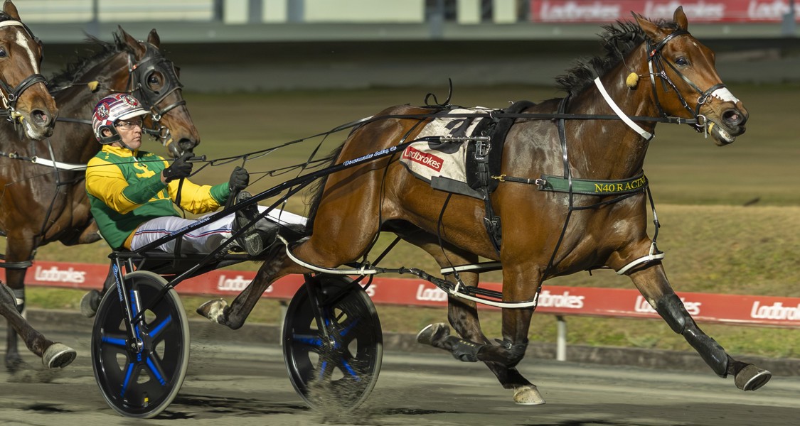 Josh Davine and Michael Brennan with driver Nathan Dawson after Debbie Lincoln's recent win.