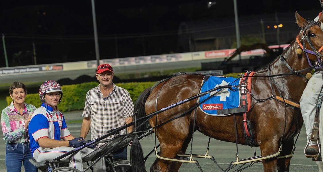The Godden stable after a Mahindi win at Redcliffe with reinsman Nathan Dawson.