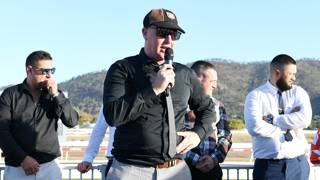 Tom ready to press the BOTB button