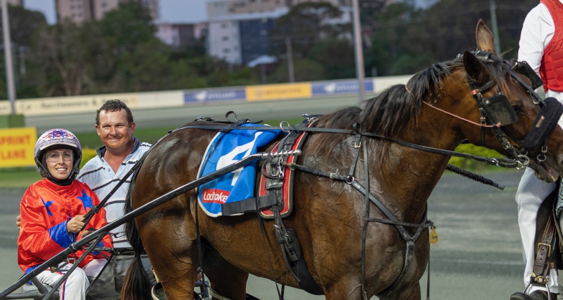 Trainer Dan Russell with driver Alanah Richardson after a recent winner.