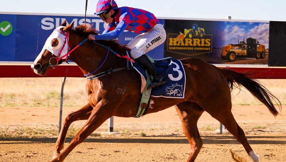 Caine Stuart after riding Smashing Rosie to victory for trainer Toni Schofield. Pictures: Roxanne Weston.