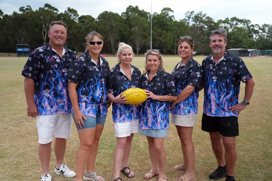 Members of the Unharnessed Hawks Syndicate at the Sandgate Hawks training ground.